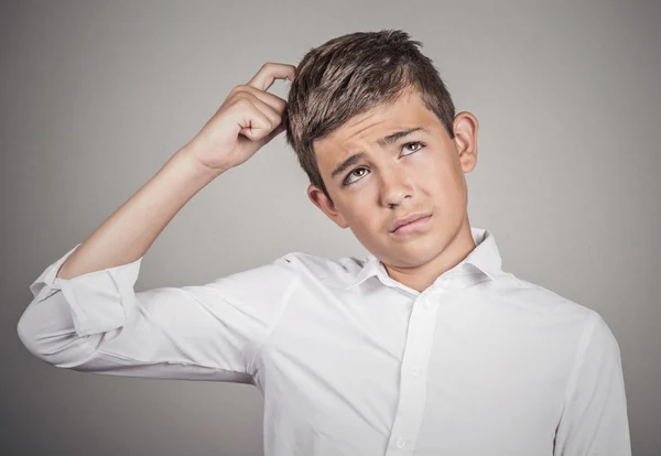 Man scratching head, thinking daydreaming about something — Stock Photo, Image