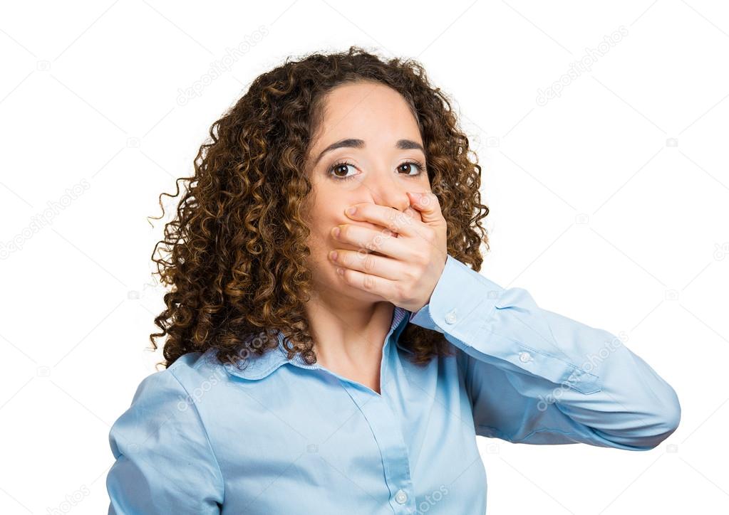 Woman covering mouth. Speak no evil concept