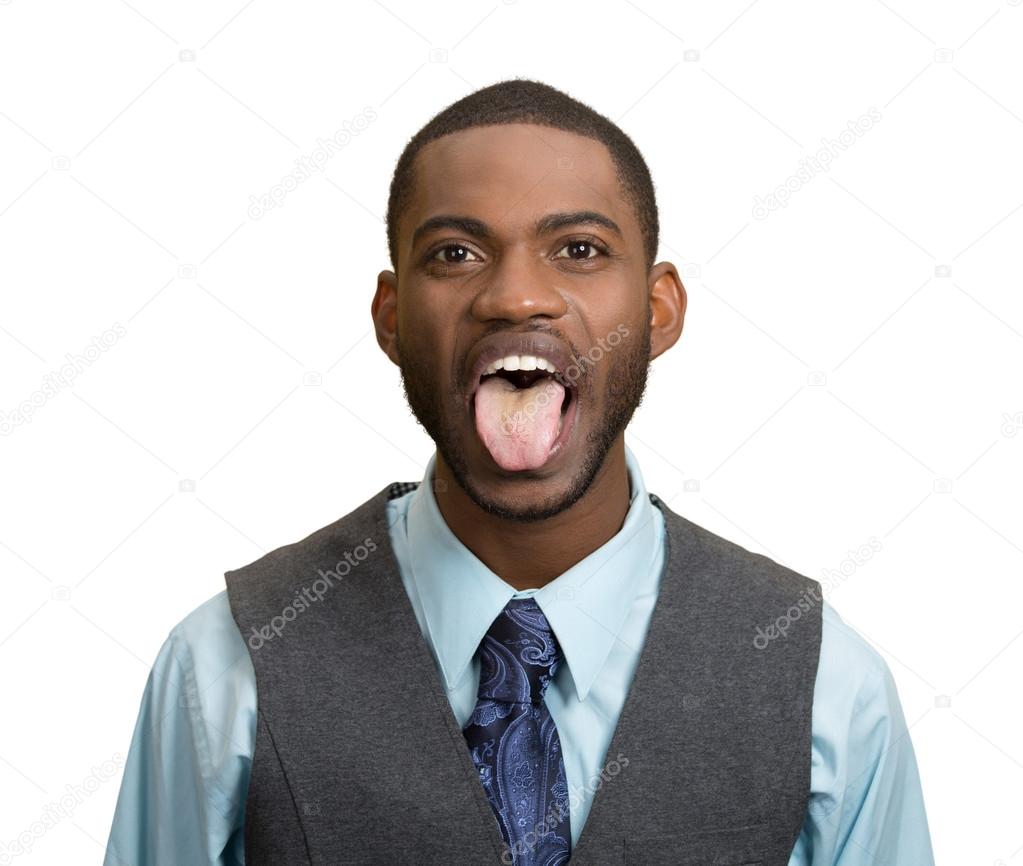 Man, employee sticking out his tongue