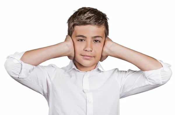 Boy covering ears with hands, doesn't want to hear loud noise, ignoring conversation — Stock Photo, Image