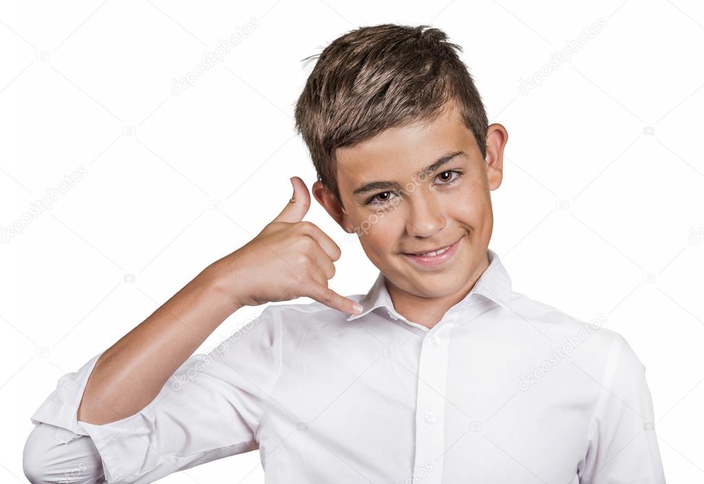 Handsome happy guy, teenager making call me gesture sign with hand 