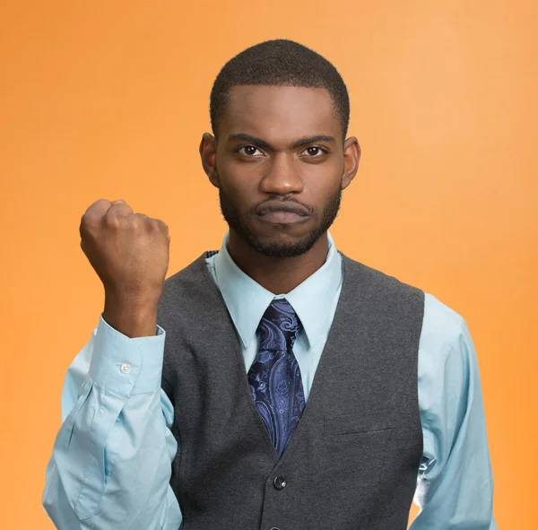 Business employee putting up fist ready to give knuckle sandwich — Stock Photo, Image