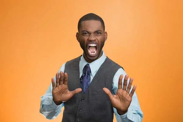 Angry man raising hands up to say no stop right there — Stock Photo, Image