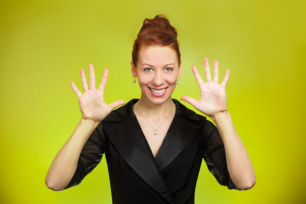 Woman making, showing five times sign gesture with two hands