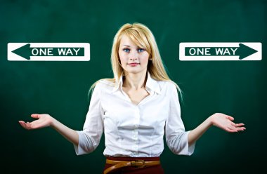 Confused young woman shrugs shoulders, uncertain which way to go in life clipart