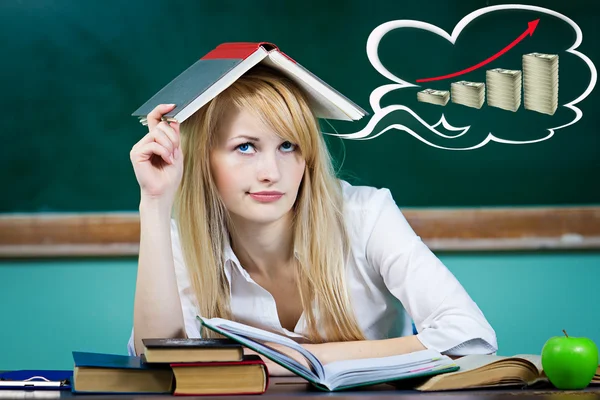 Student, teacher, daydreaming to repay her loan — Stock Photo, Image