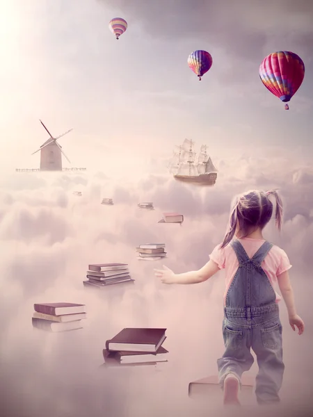 In search for knowledge concept. Girl walking down the book pass above clouds — Stock Photo, Image
