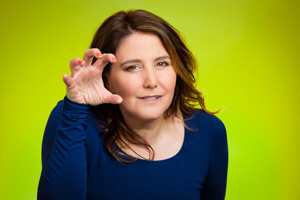 Angry woman, threatening someone with her claws nails 