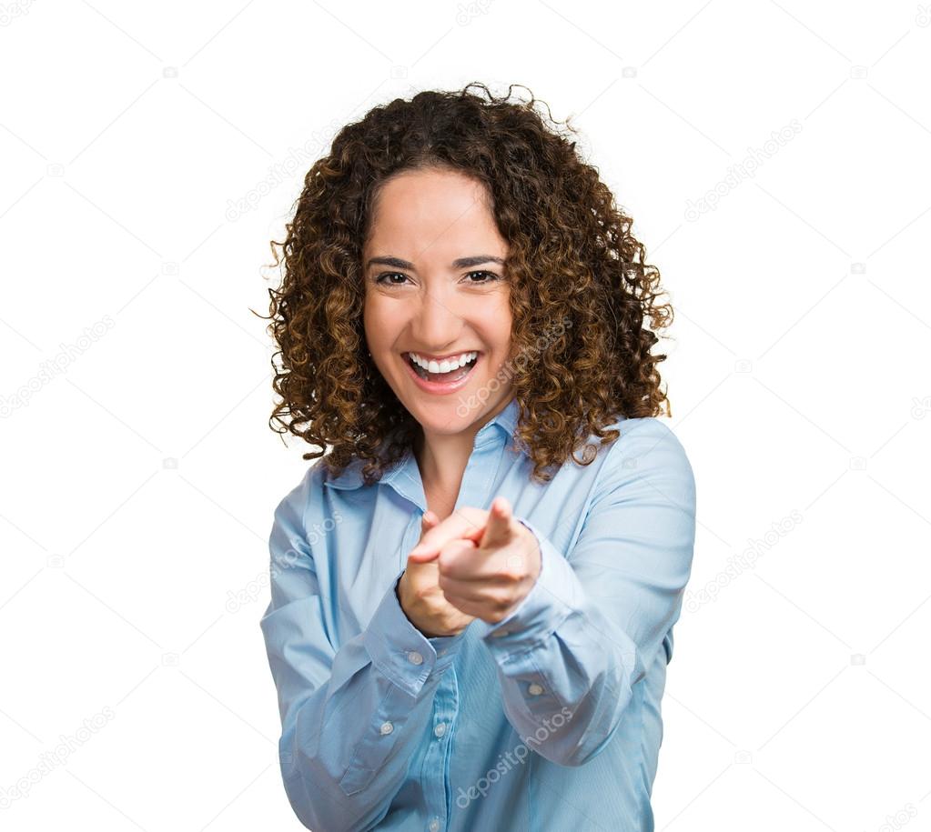 Happy woman smiling, laughing, pointing finger at you