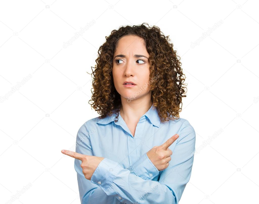 Confused woman pointing in two different directions