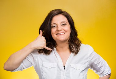Woman showing call me gesture clipart