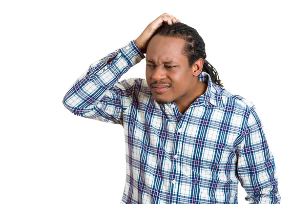 Portrait young man thinking scratching head — Stock Photo, Image