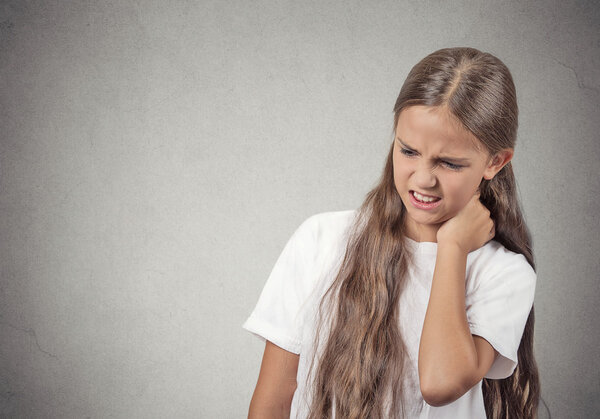 young teenager girl with neck pain