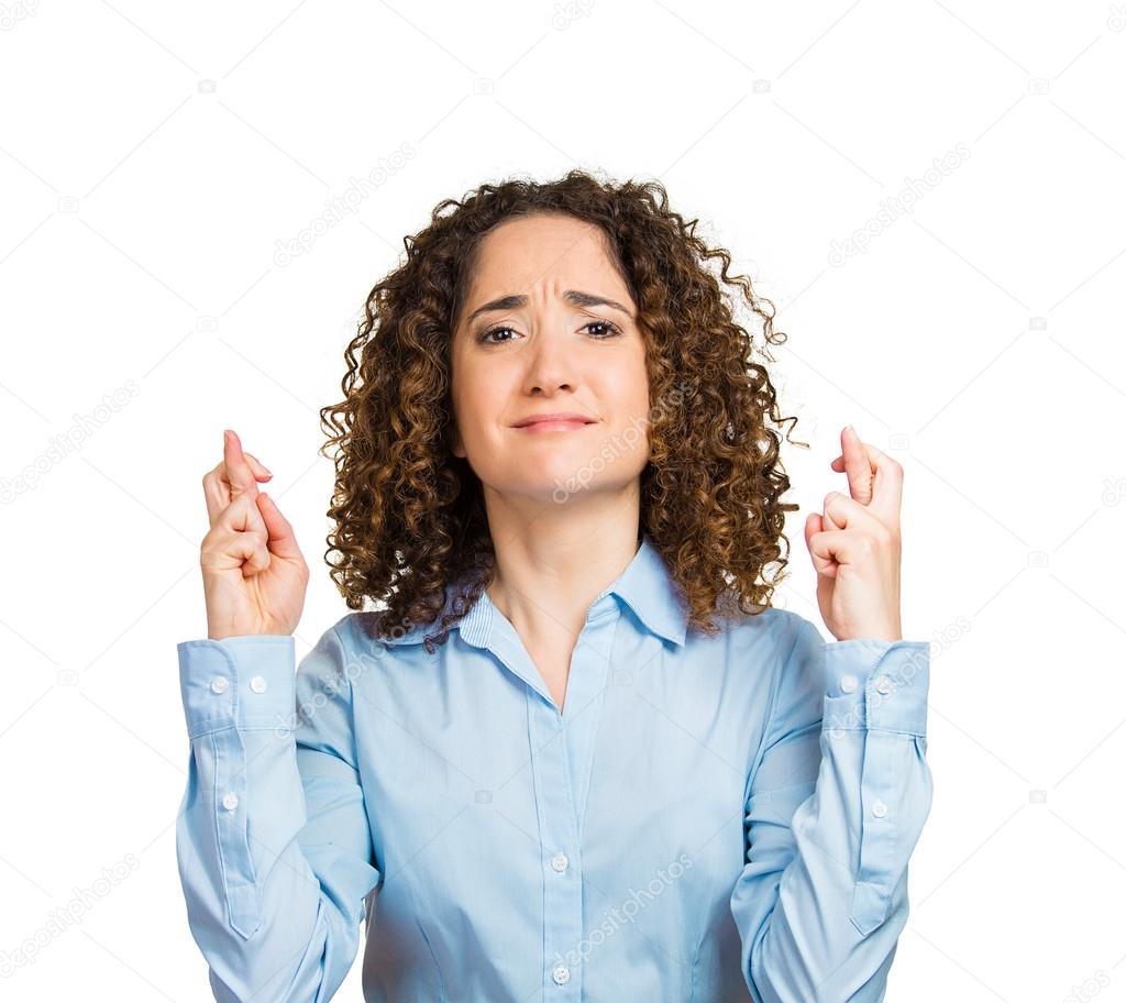 Woman crossing fingers