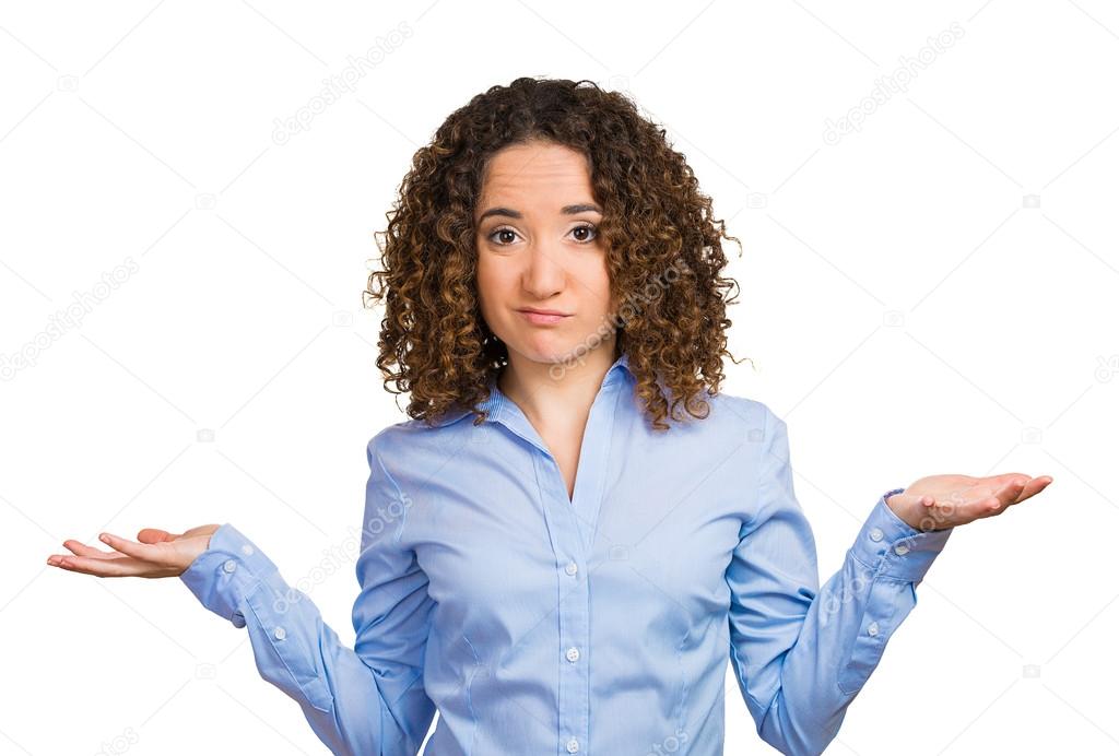 Unhappy young woman with arms out asking what is problem so what