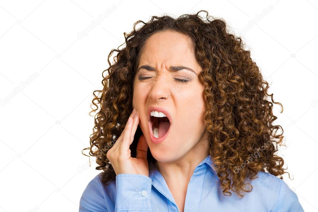 Woman with sensitive tooth ache