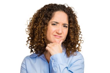 Skeptical young lady, woman looking suspicious clipart