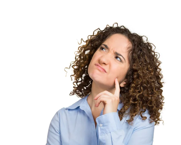 Thoughtful young woman looking up — Stock Photo, Image