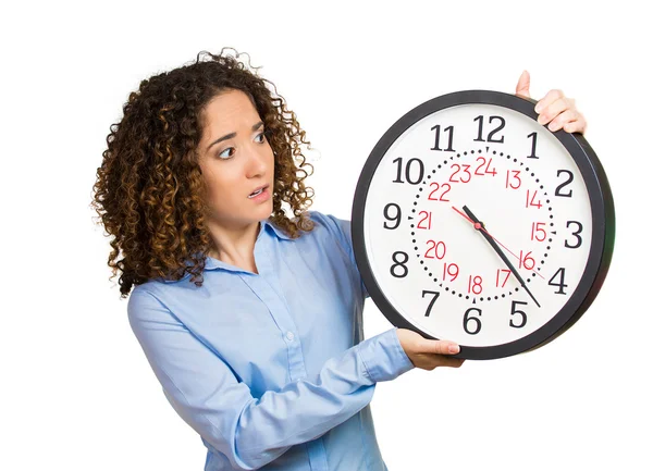 Woman, worker, holding clock looking anxiously, pressured by lack of time — Stock Photo, Image