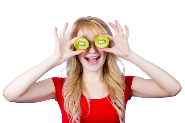 Mujer emocionada y sonriente con kiwi —  Fotos de Stock