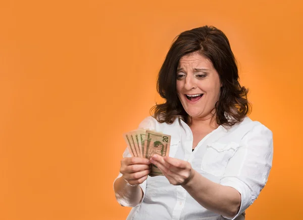 Žena držící dolarové bankovky — Stock fotografie