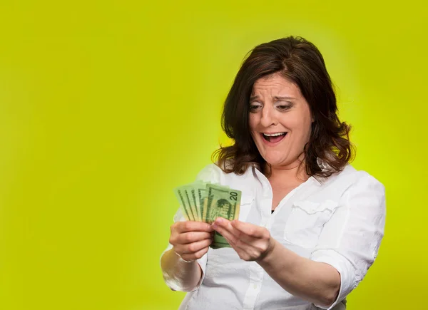 Žena držící dolarové bankovky — Stock fotografie