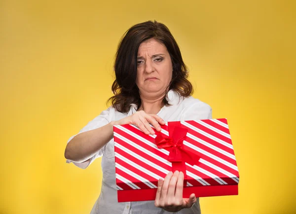Woman unhappy with gift — Stock Photo, Image
