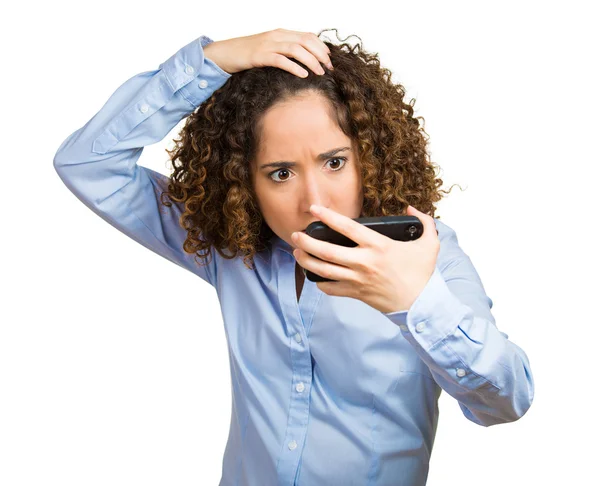 Shocked young woman, feeling head, surprised she is losing hair Stock Photo