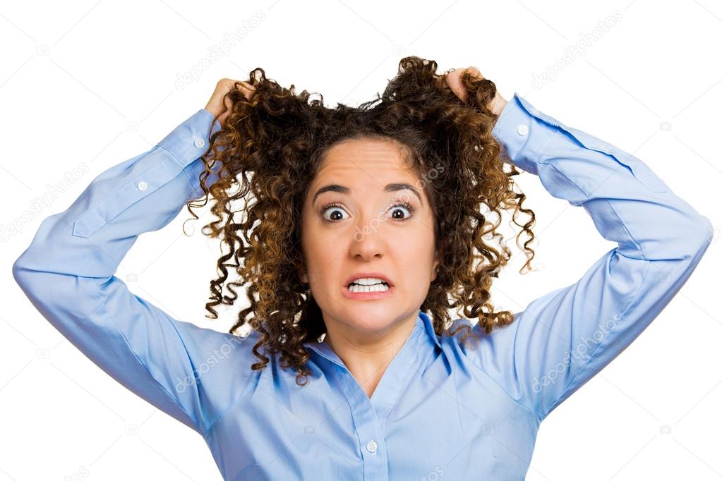 Stressed business woman, pulling her hair out, yelling