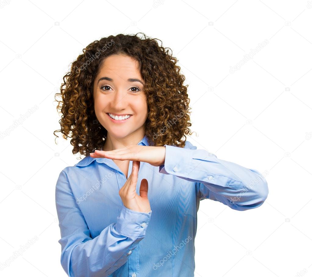 Smiling woman showing time out gesture