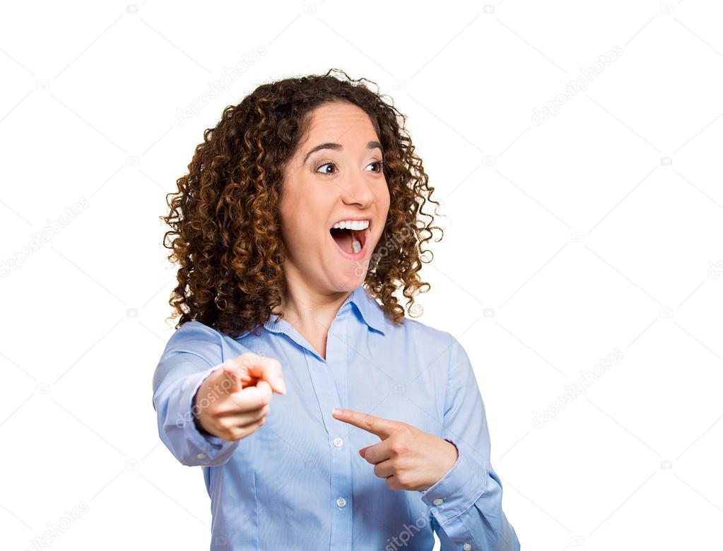 Woman, laughing, pointing with finger at someone