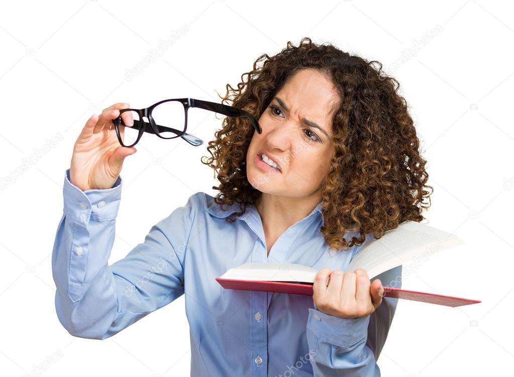 Young lady, woman can't see read book, has vision problems