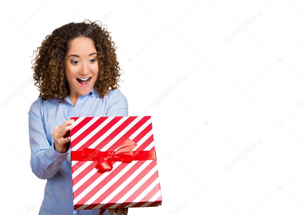 Happy excited woman opening red gift box