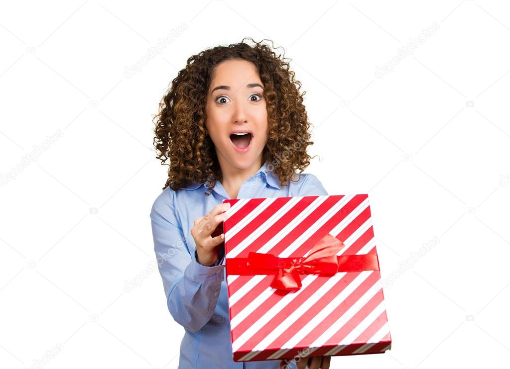 Happy excited woman opening red gift box