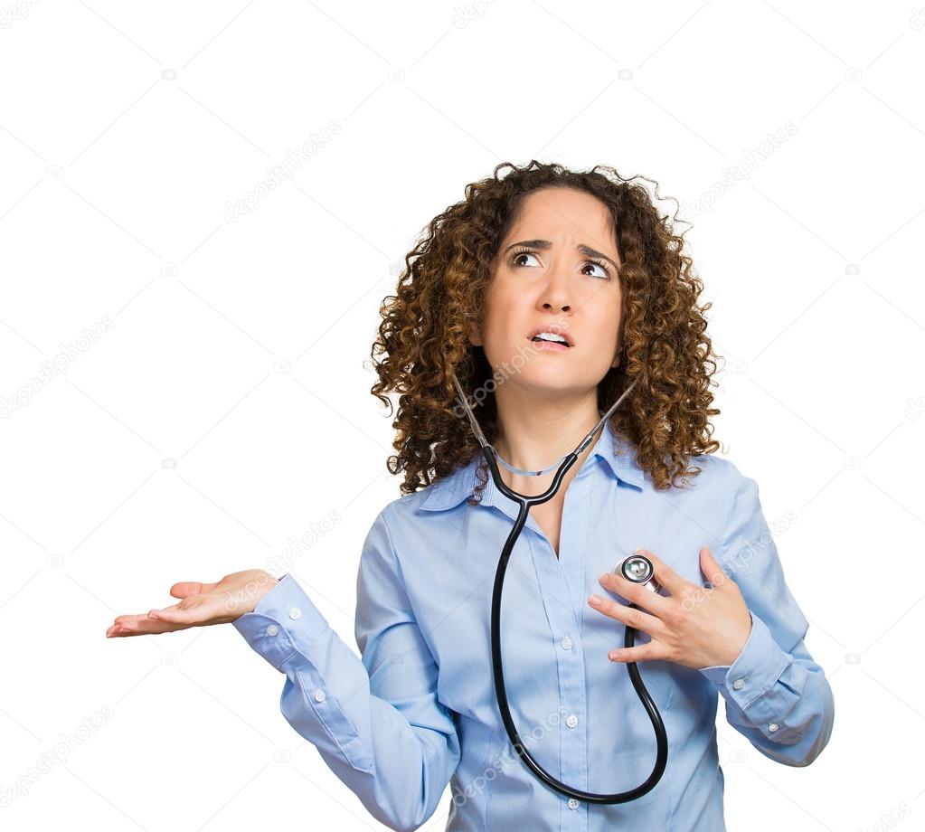 Woman, worker listening heart with stethoscope