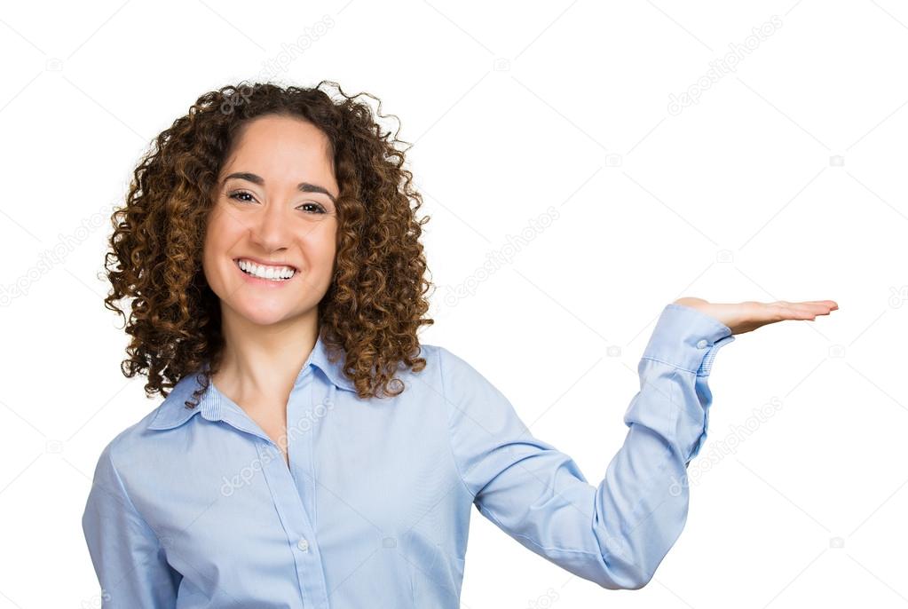 Woman pointing presenting at copy space
