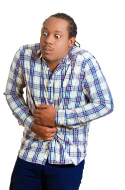 Sağlıksız, genç adam, mide ağrısı iki katına