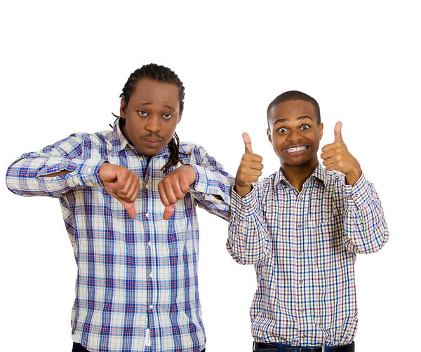 two men angry giving thumbs down, optimistic giving thumbs up