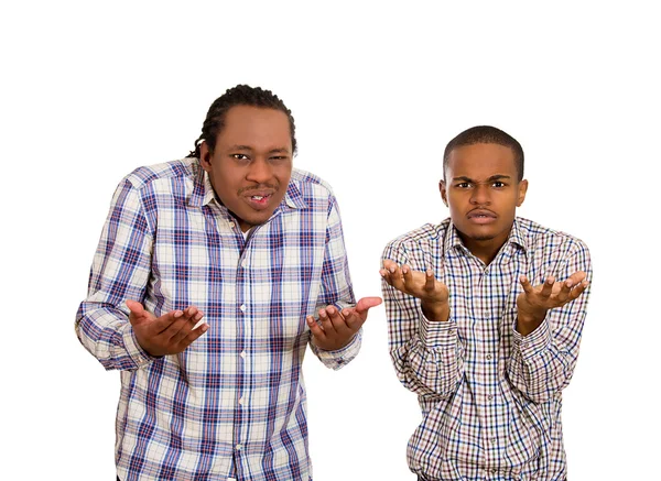 Angry, unhappy, young men arms out asking what's problem — Stock Photo, Image