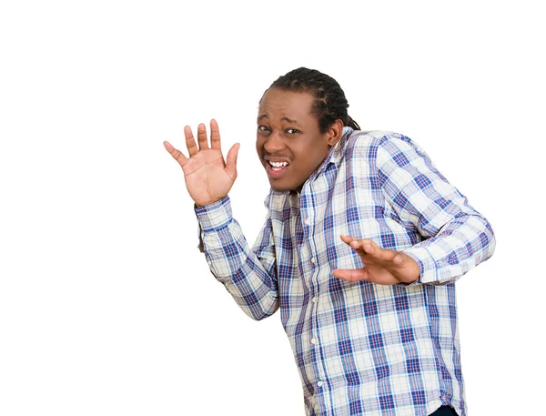 Hombre mirando sorprendido asustado tratando de protegerse — Foto de Stock