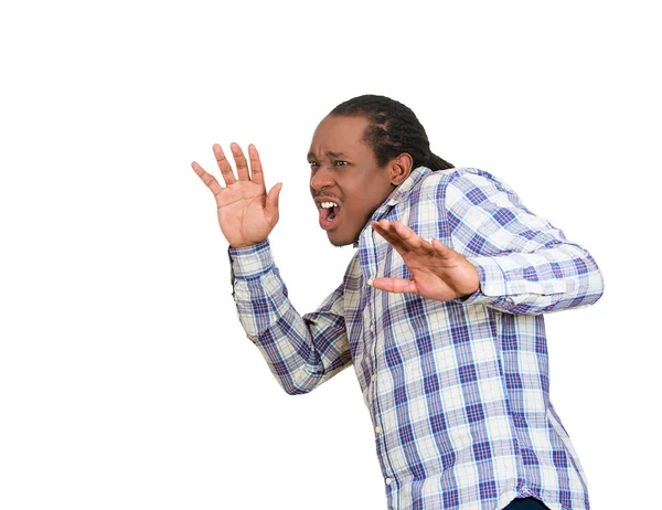 Hombre mirando sorprendido asustado tratando de protegerse — Foto de Stock