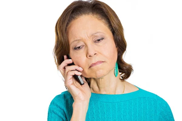 Sad, depressed, unhappy worried senior woman talking on phone — Stock Photo, Image