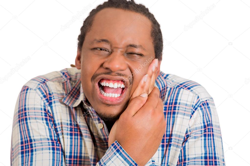 man touching face having bad pain, tooth ache