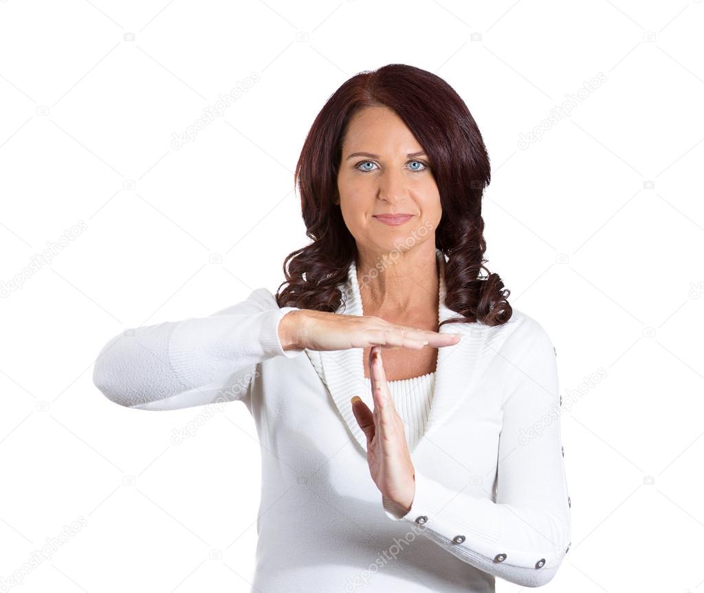 smiling woman showing time out gesture