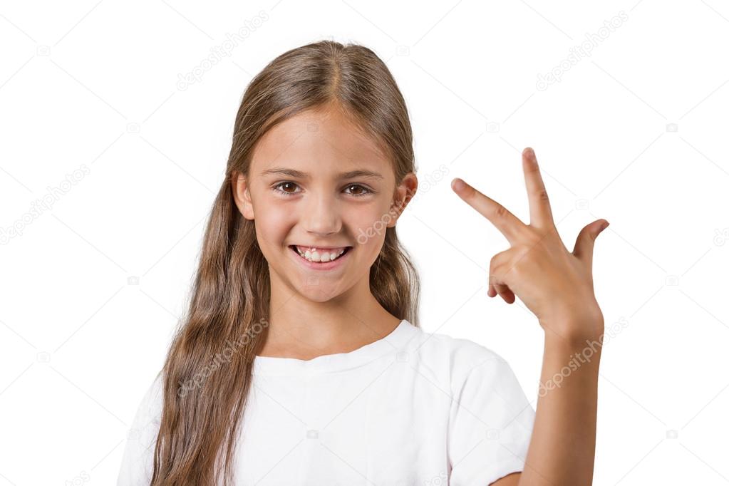 girl showing three fingers