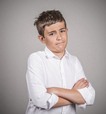 skeptical young man looking at you  clipart