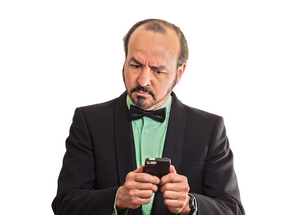 Puzzled confused businessman looking at smartphone — Stock Photo, Image