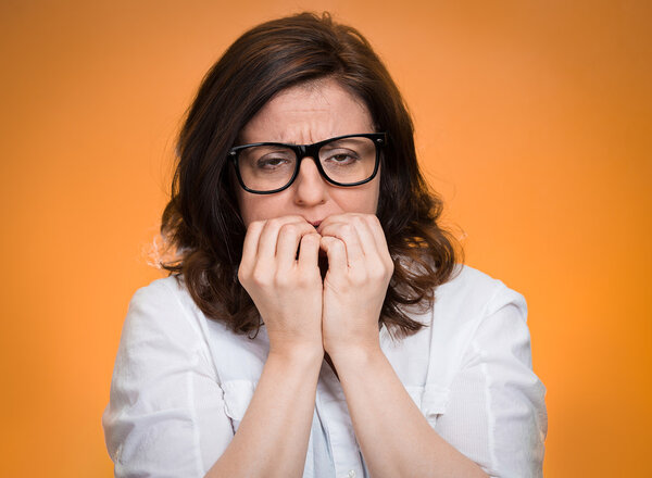 nervous, stressed middle aged woman
