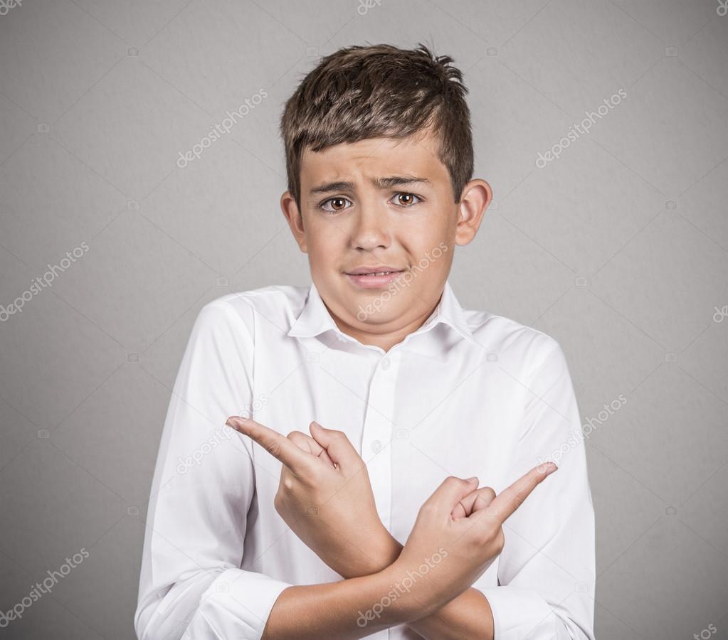 confused young man pointing in two different directions
