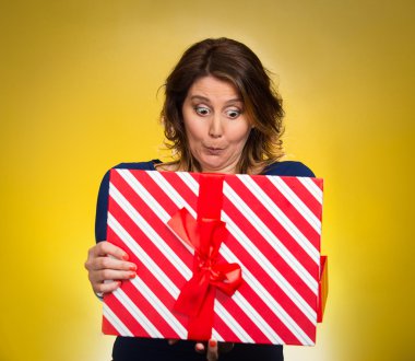 woman opening red gift box, surprised  clipart
